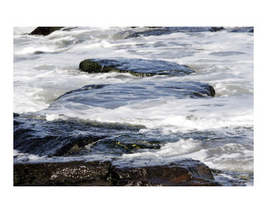 Waves Over the Rocks at the Ocean Shore 1