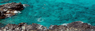 Two People Swimming in the Ocean, Oahu, Hawaii