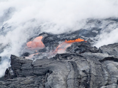 Steam Plumes from Hot Lava Flowing onto Beach and into the Ocean