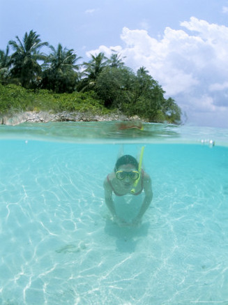 Woman Snorkelling, North Male Atoll, Maldives, Indian Ocean